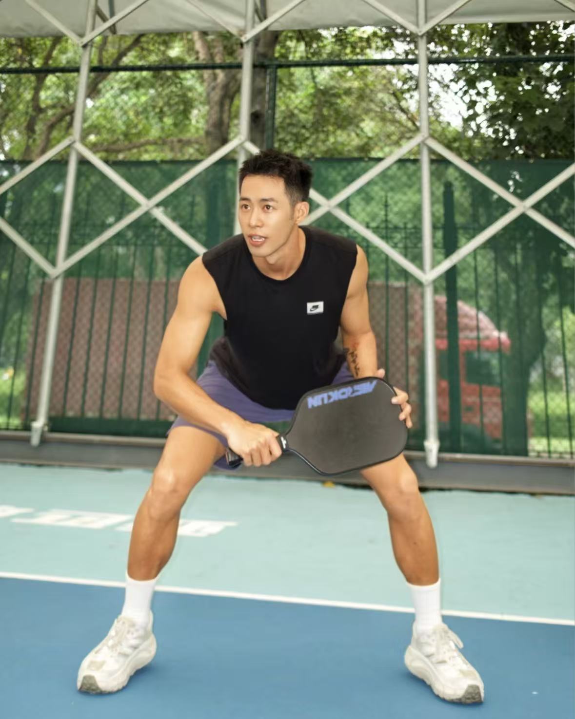 Victor Tan playing pickleball