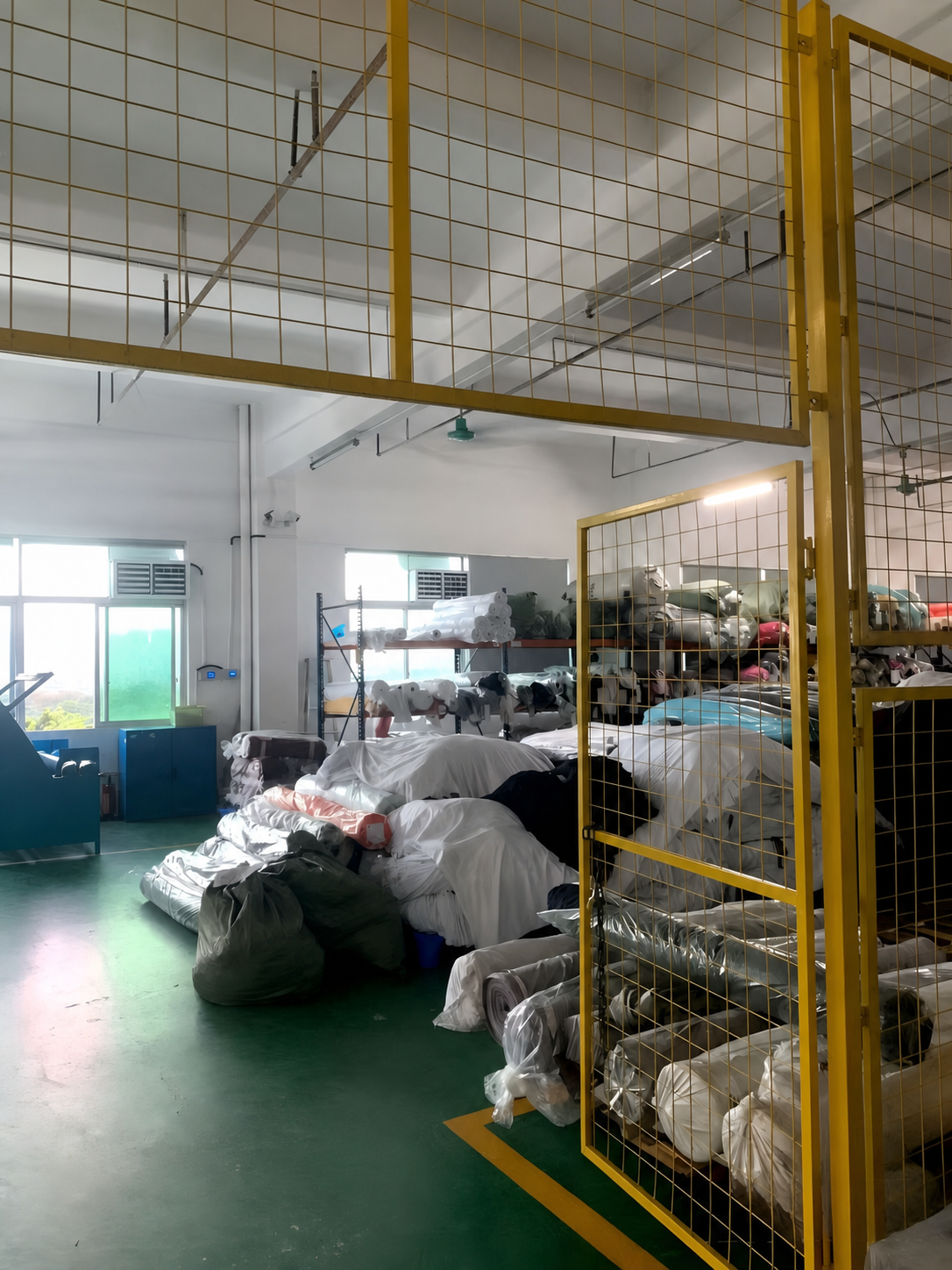 Factory raw-material area for custom apparel fabrics